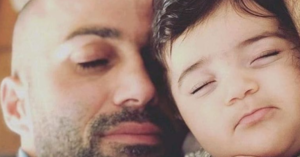 Kurdia Molani sleeping with his father, Hiva Molani