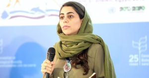 Ghanimat Azhdari giving speech