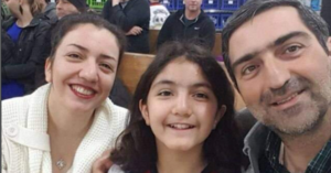 Anisa Sadeghi in the gym with her parents, Bahareh Hajesfandiari and Mirmohammadmehdi