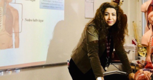 Mitra Ahmady working as a teacher