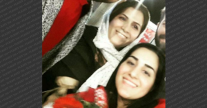 Ayeshe Pourghaderi and Fatemeh Pasavand being greeted at the airport