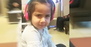 Sophie Emami listening to music