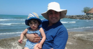 Farhad Niknam and daughter at the beach