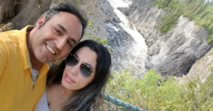 Farhad Niknam taking selfie with his wife