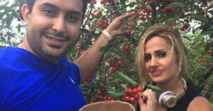 Parinaz and Iman Ghaderpanah, picking cherries